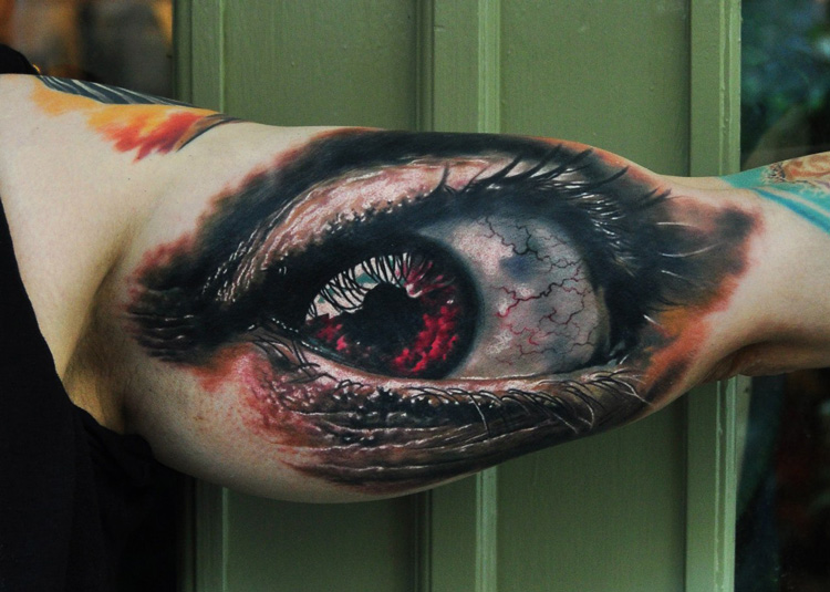 Biceps Eye realistic tattoo
