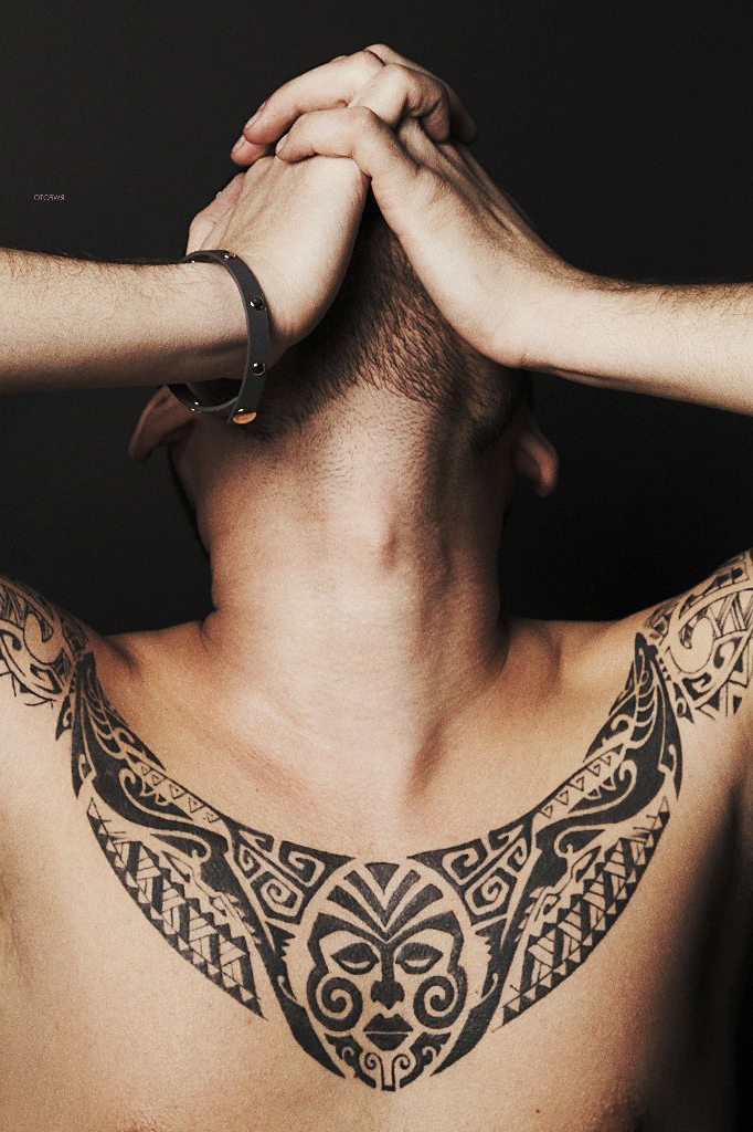 Polynesy Face on Chest tattoo