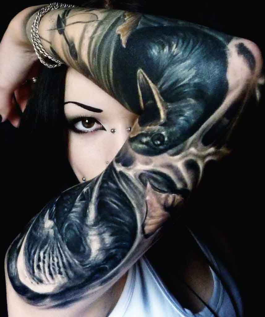 Raven hand tattoo