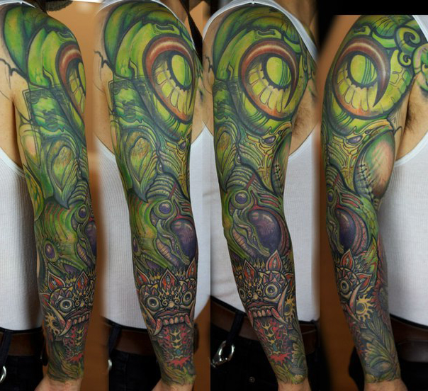 Spooky Green Dragons tattoo sleeve idea