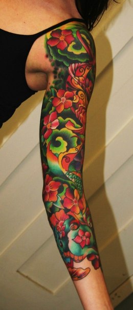 Green Waves and Flowers tattoo sleeve