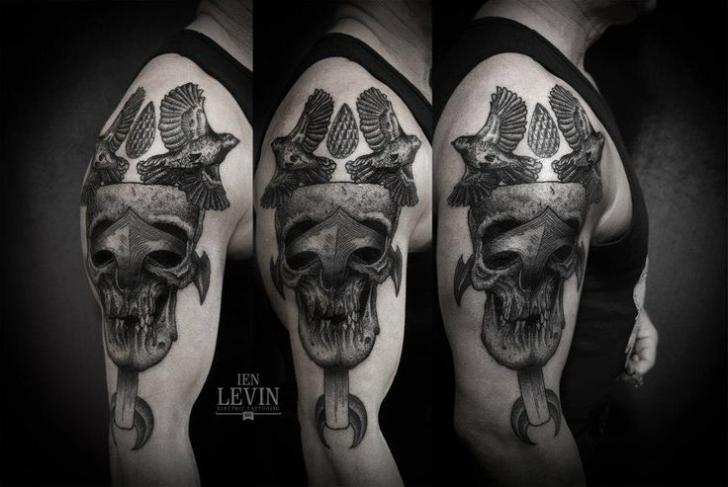 Anchor in Eyes Scull tattoo by Ien Levin