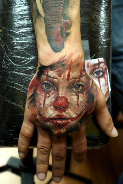 Back of The Hand Clown Girl tattoo by Bloodlines Gallery