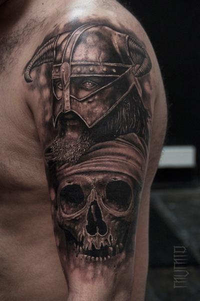 Horn Helmet Warrior and Scull tattoo by Mumia Tattoo
