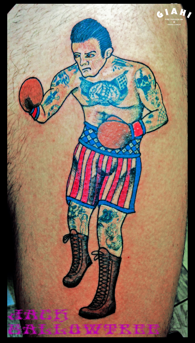 Tiny boxers tattooed onm Matthew Koma's forearm.