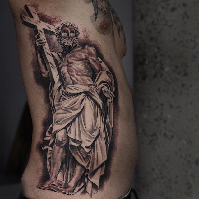 Man with Crucifix tattoo by Noah Minuskin