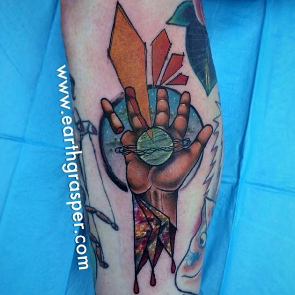Planet in Hand Abstract tattoo by Earth Gasper Tattoo