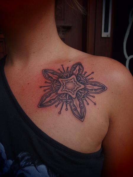 Star Flower Dotwork tattoo by Papanatos Tattoos