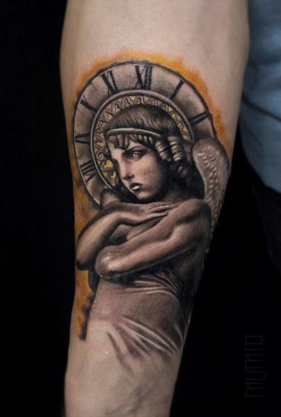 Time Angel Graphic tattoo by Mumia Tattoo