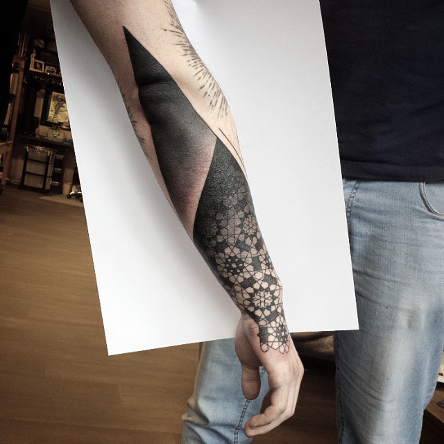 Blacwork tattoo sleeve by Rudolf Tattooer From Space