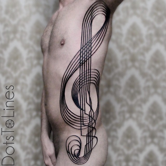 Body Side Blackwork Treble Clef tattoo by Chaim Machlev