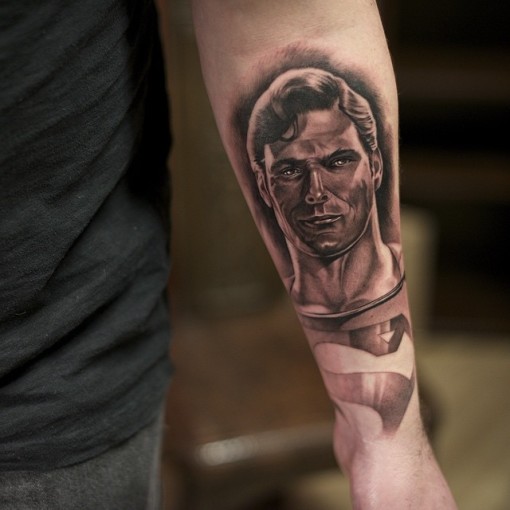 Graphic Arm Superman tattoo by Charles Saucier - Best Tattoo Ideas Gallery