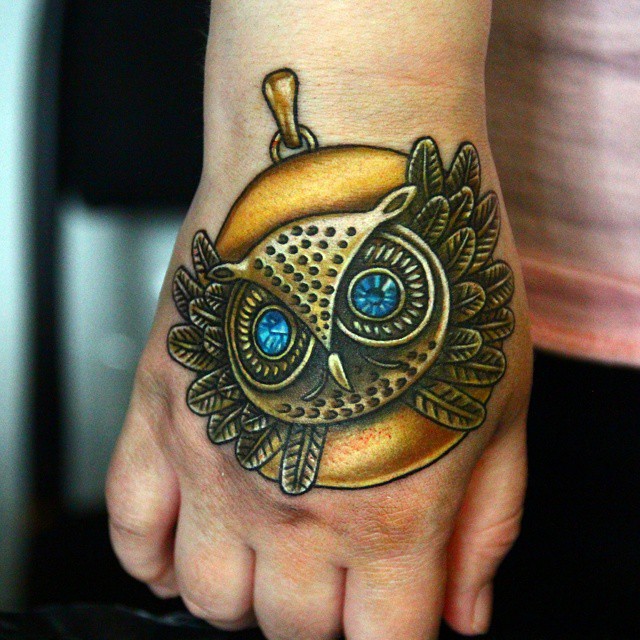 Metal Golden Owl Hand tattoo