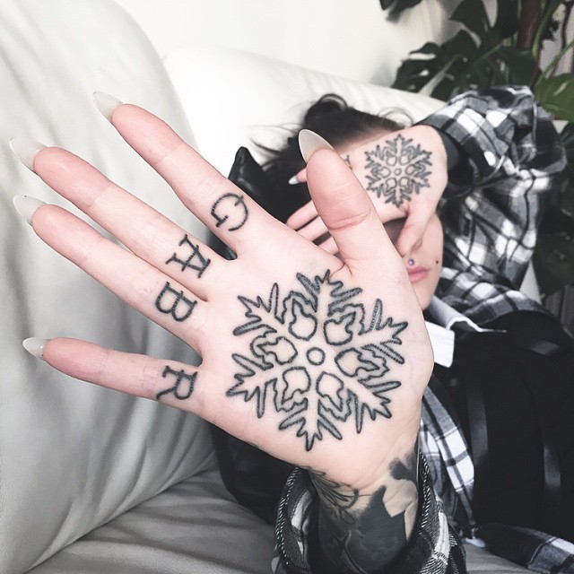 Snowflake Hand tattoo
