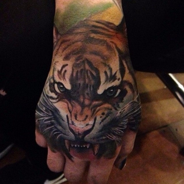 Tiger Face Hand tattoo