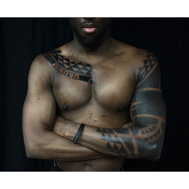 Chest and Sleeve Tirangles Blackwork tattoo