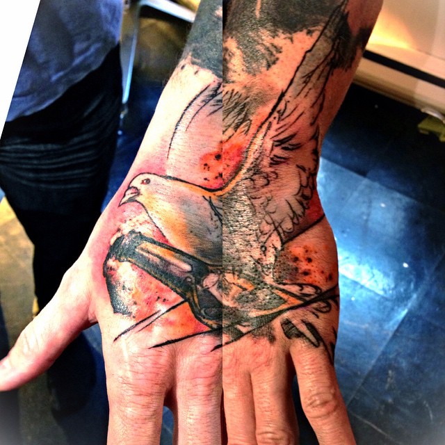 Cocktail Dove Hand tattoo