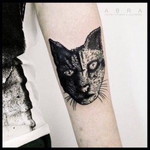 Crosses in Eyes Cat Arm tattoo - Best Tattoo Ideas Gallery