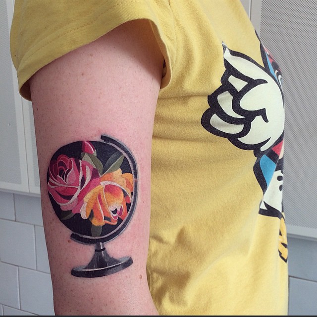 Fower Globe tattoo on Arm