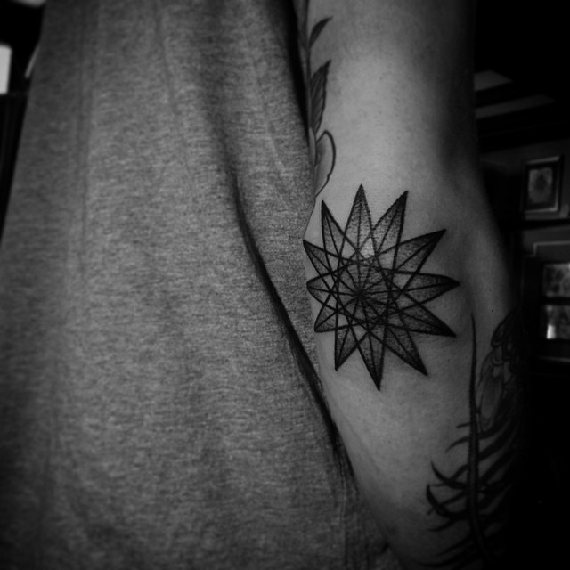 Geometry Lines Star Elbow tattoo