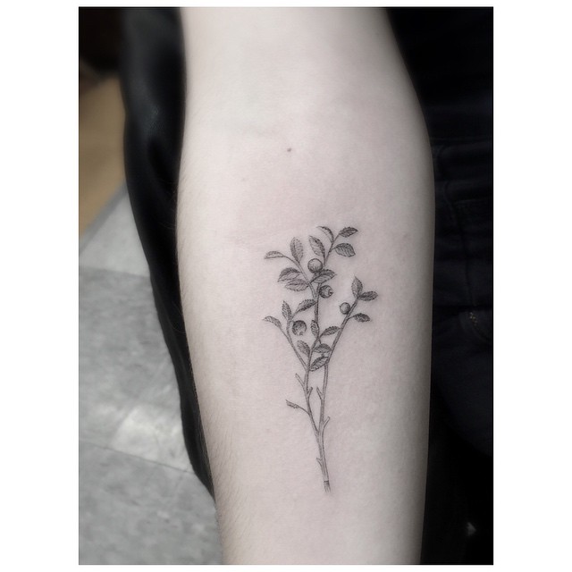 Little Huckleberry Arm tattoo