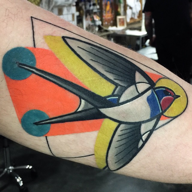 Orange Swallow Arm tattoo