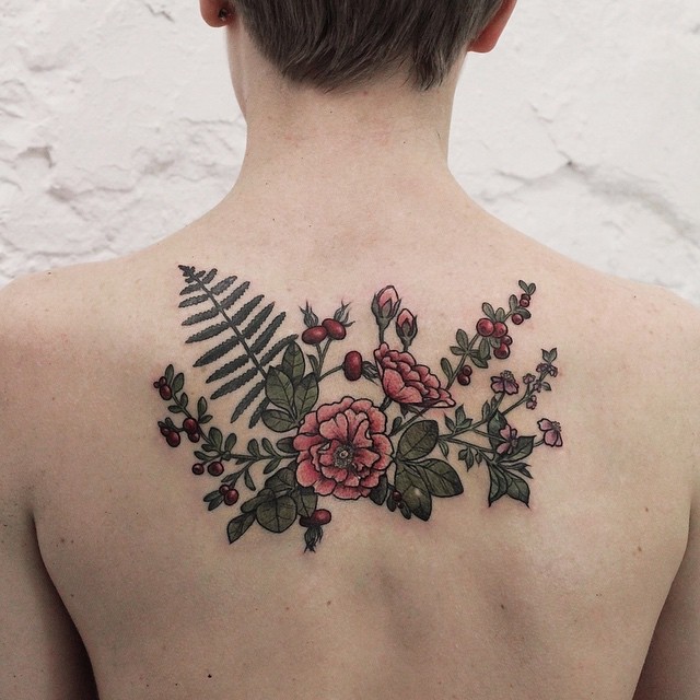 Pretty Flowers and Berries tattoo on Back