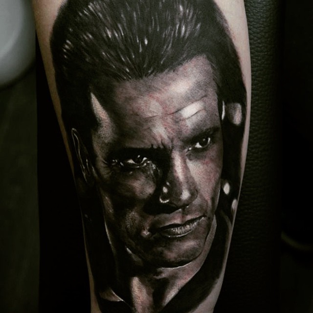 Realistic Arnold Schwarzenegger tattoo