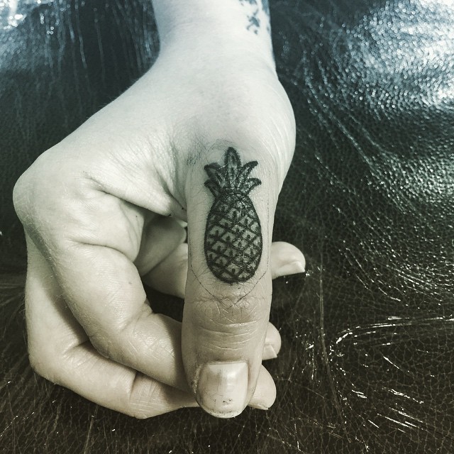 Small Pineapple Finger tattoo