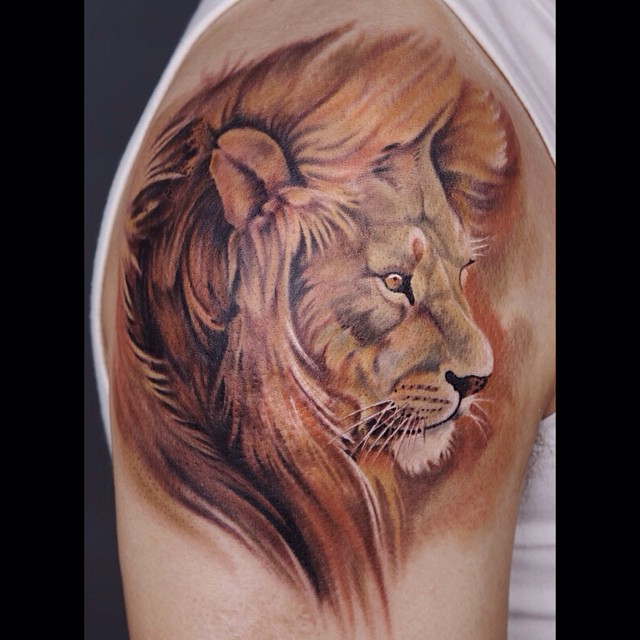 Watercolor Shoulder Lion tattoo