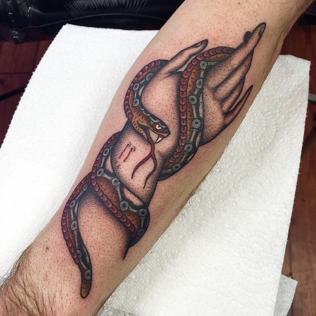 Snake Sting Hand tattoo on Arm