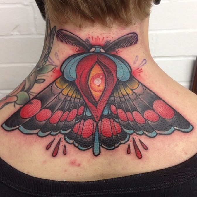 Back of Neck Moth Tattoo