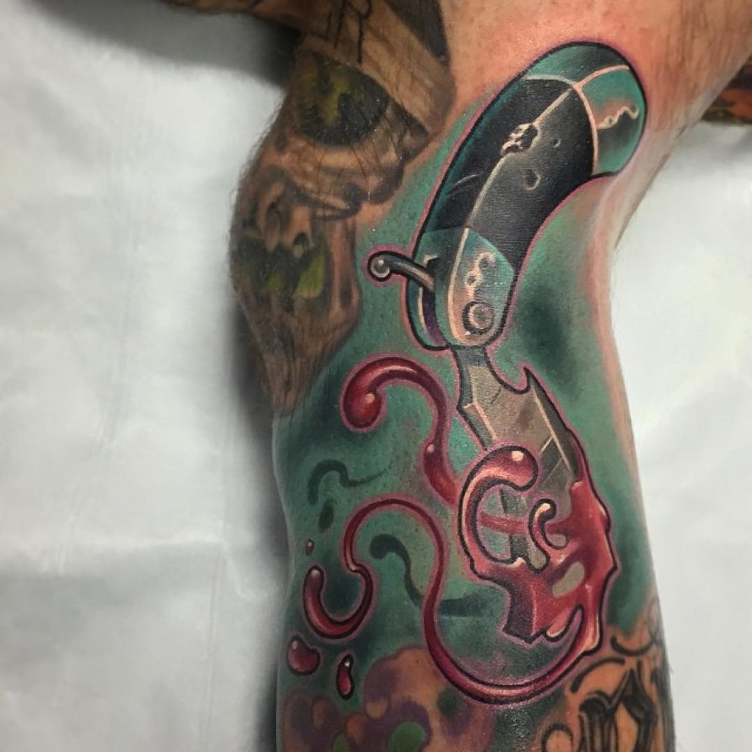 Bloody Razor Tattoo on Leg