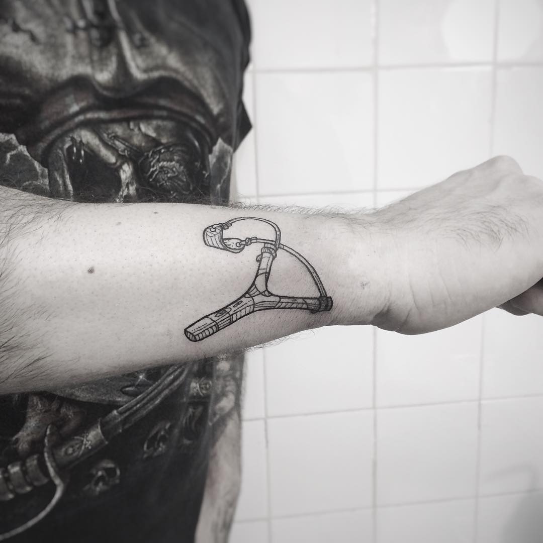 Slingshot Tattoo on Arm