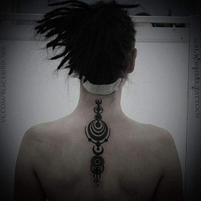 Spine Blackwork Sign Tattoo