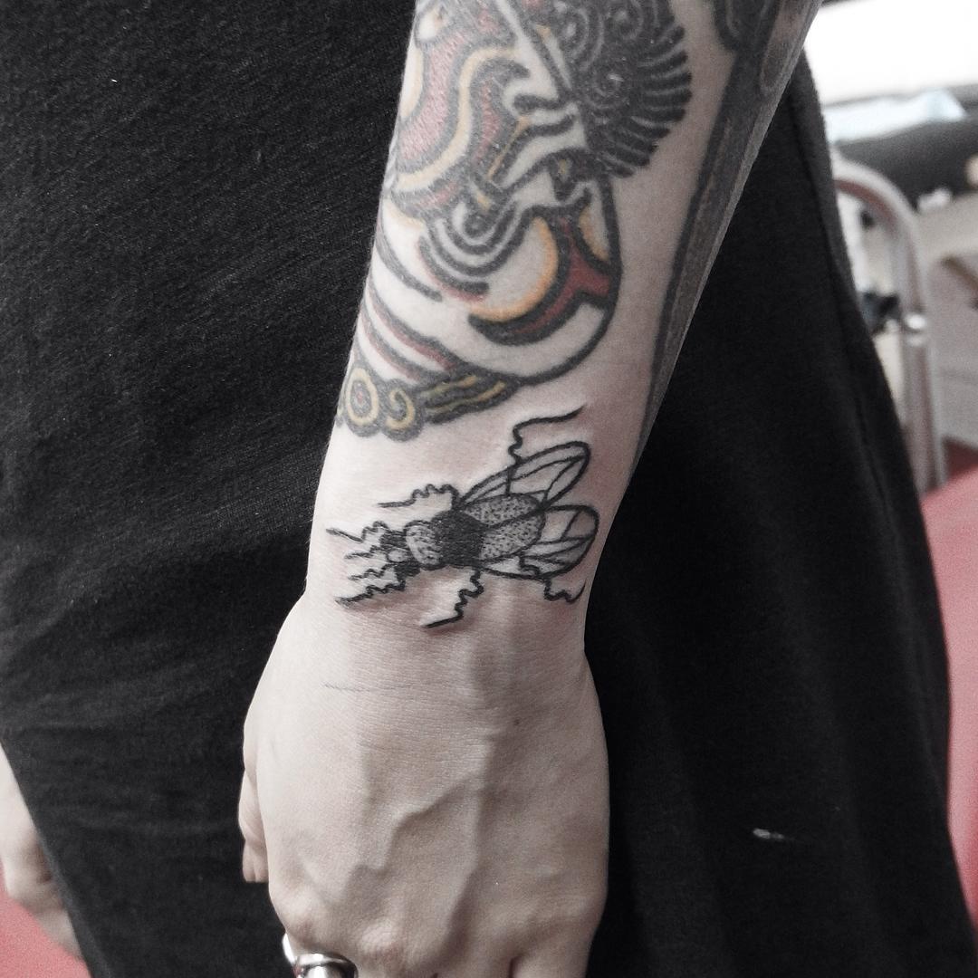 Wrist Fly Tattoo