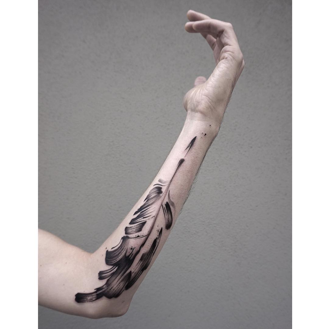 Feather Arm Tattoo