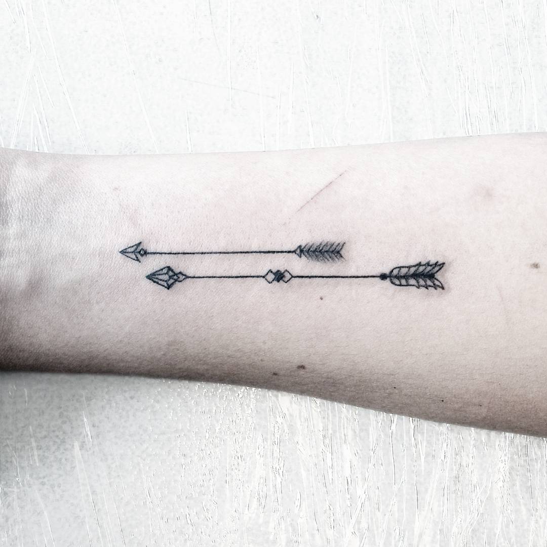 Small Arrows Tattoo on Arm