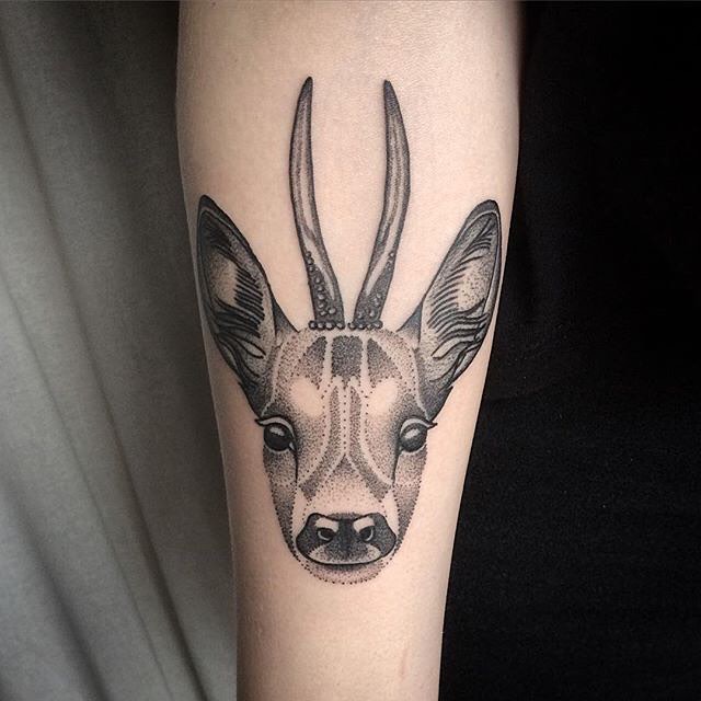 very decent tattoo of a deer. tattoo on arm