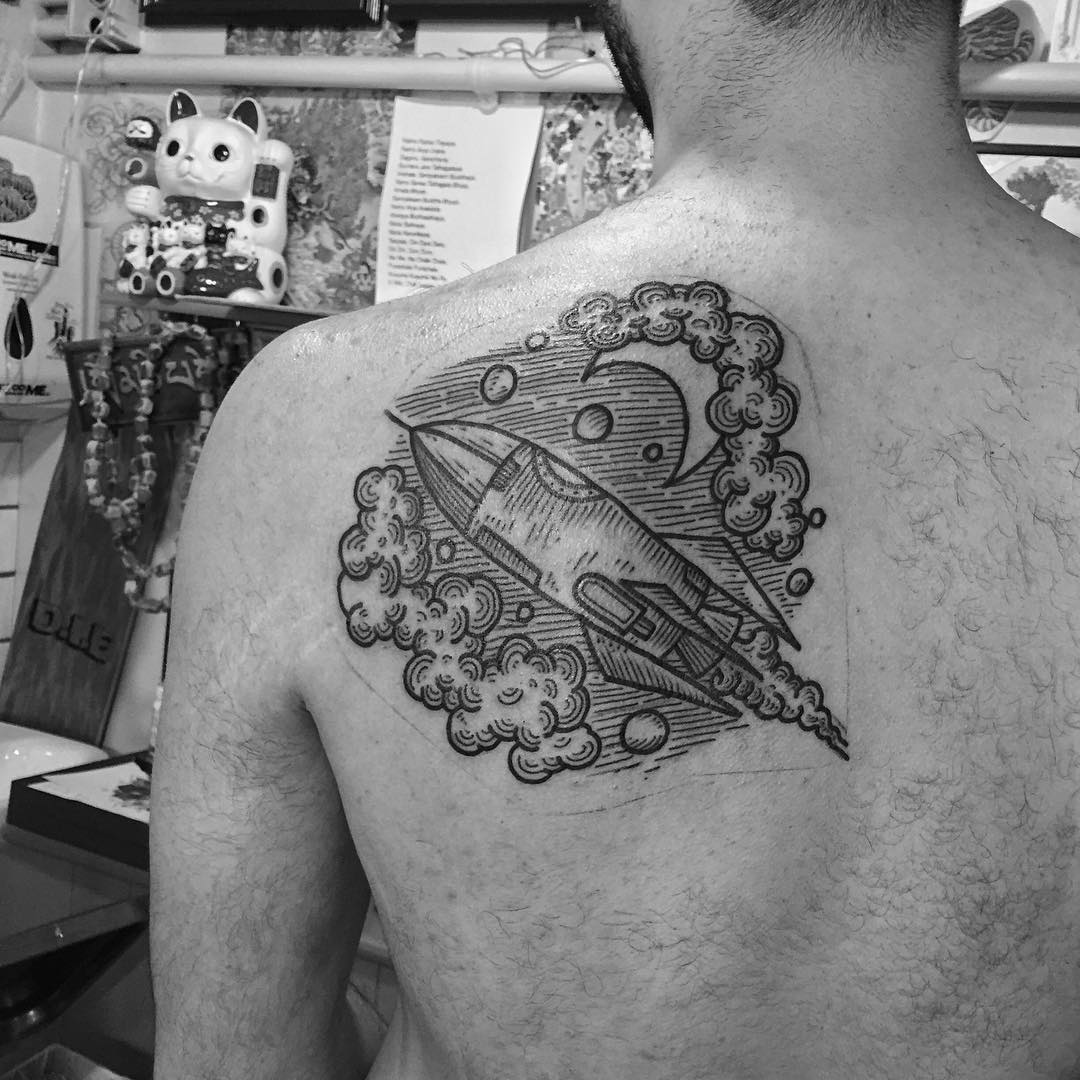 Shoulder Blade Rocket Tattoo Etching by Kolahari