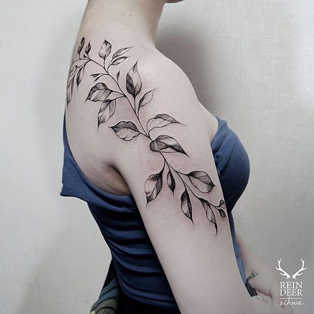 many leaves tattoo on shoulder and back
