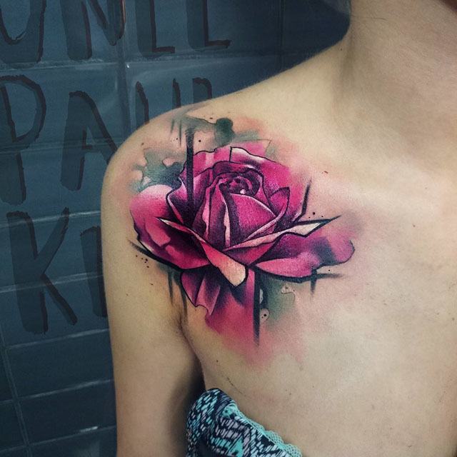 watercolor rose tattoo on shoulder