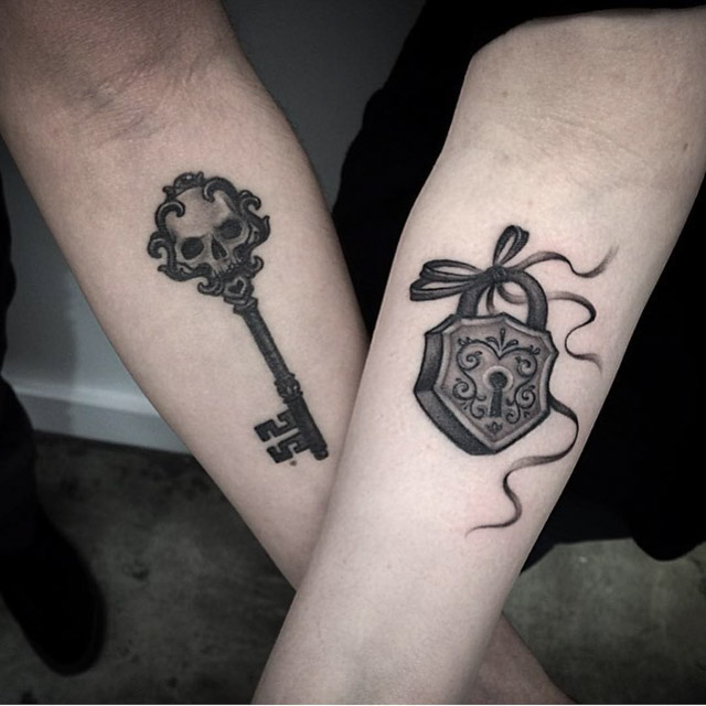 key and lock couple tattoos on arms
