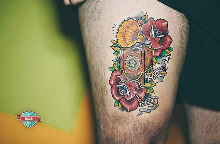 thigh neo-traditional gramophone tattoo