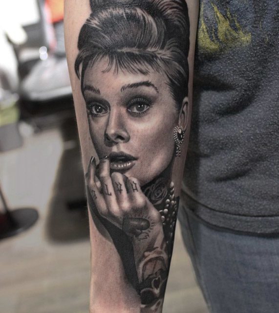 portrait tattoo on arm