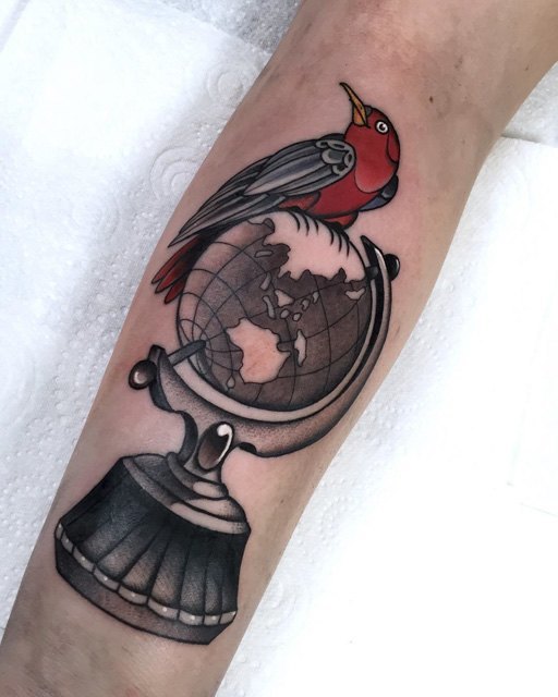 globe and the bird tattoo