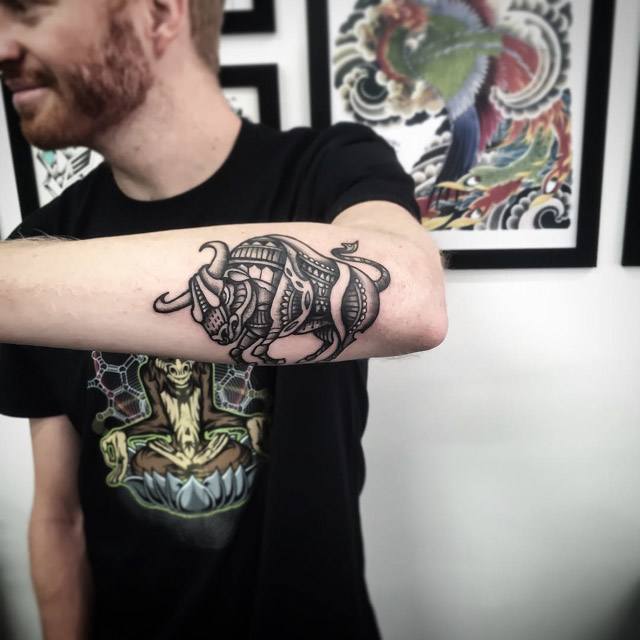 outer forearm bull tattoo