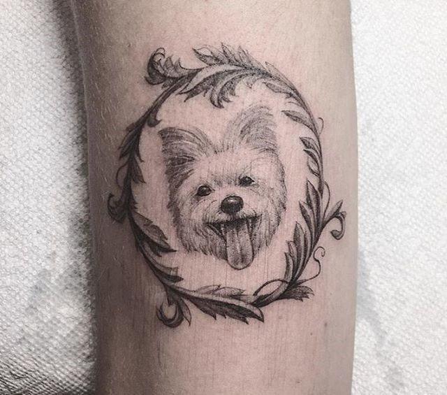 cute dog tattoo in a round frame