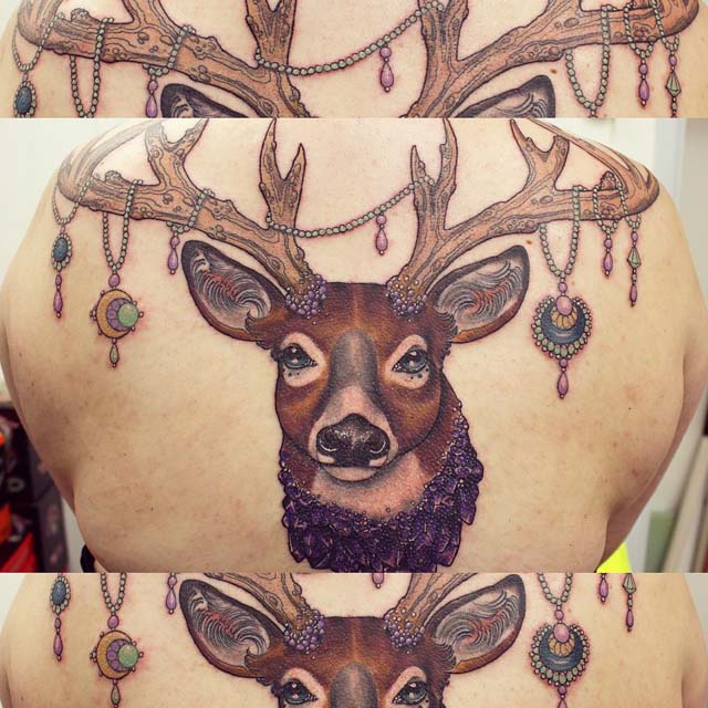 stag tattoo on back