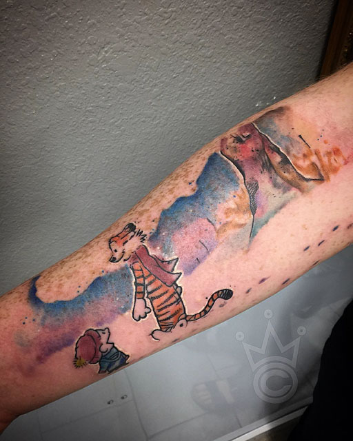 kid cartoon watercolor tattoo on arm